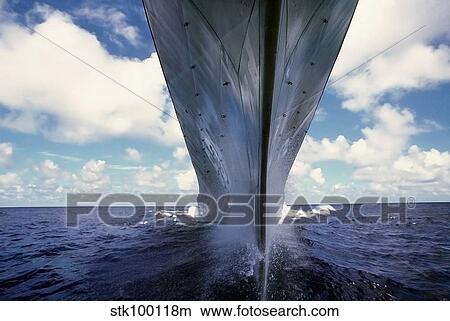 Picture - A water-level bow view of the battleship USS Missouri.. Fotosearch