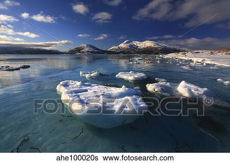 Stock Photograph - A winter view looking out in Tjeldsundet strait, Norway.. Fotosearch