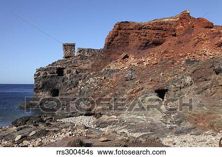 Abandoned Manganese Mine at Cape Vani, Milos Island, Greece. View Large Photo Image Stock Photograph - Abandoned Manganese Mine at Cape Vani, Milos Island, Greece.. Fotosearch