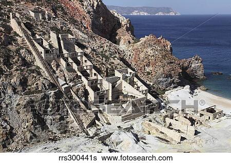 Abandoned sulfur processing facility with powered incline, Milos, Greece. View Large Photo Image Stock Photograph - Abandoned sulfur processing facility with powered incline, Milos, Greece.. Fotosearch
