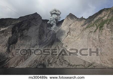 Active crater and debris slope below at Batu Tara volcano, Indonesia. View Large Photo Image Stock Photograph - Active crater and debris slope below at Batu Tara volcano, Indonesia.. Fotosearch