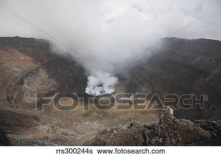 Active lava lake degassing in summit caldera, Nyiragongo Volcano, Democratic Republic of the Congo. View Large Photo Image Stock Photograph - Active lava lake degassing in summit caldera, Nyiragongo Volcano, Democratic Republic of the Congo.. Fotosearch