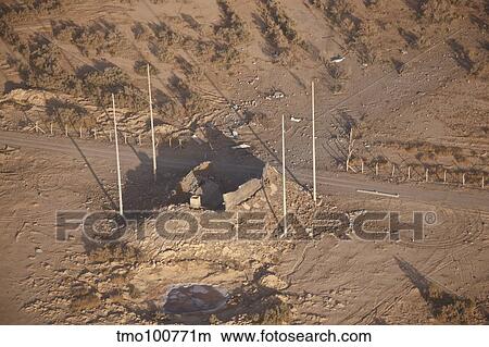 Aerial view of a destroyed Iraqi ammunition magazine. View Large Photo Image Picture - Aerial view of a destroyed Iraqi ammunition magazine.. Fotosearch