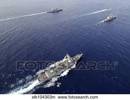 Aerial view of a naval fleet transiting the Pacific Ocean. View Large Photo Image Picture - Aerial view of a naval fleet transiting the Pacific Ocean.. Fotosearch
