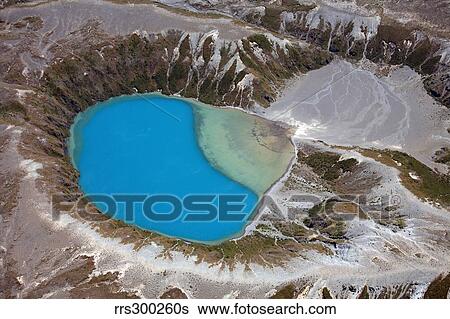 Stock Photograph - Aerial view of crater lake in Tongariro volcanic complex, New Zealand.. Fotosearch