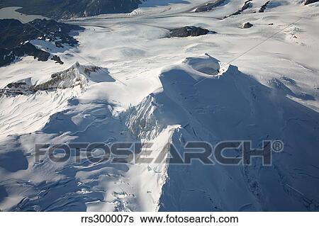 Aerial view of glaciated Mount Douglas volcano, Alaskan Peninsula. View Large Photo Image Stock Photograph - Aerial view of glaciated Mount Douglas volcano, Alaskan Peninsula.. Fotosearch