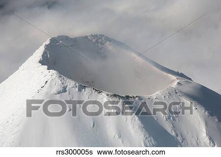 Aerial view of summit of Shishaldin Volcano, Unimak Island, Alaska. View Large Photo Image Stock Photograph - Aerial view of summit of Shishaldin Volcano, Unimak Island, Alaska.. Fotosearch