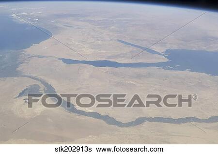 Stock Photograph - Aerial view of the Egypt and the Sinai Peninsula along with part of the Mediterranean Sea and Red Sea.. Fotosearch