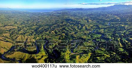 Stock Photograph - Aerial view of the Nadi River winding through the valley in Fiji.. Fotosearch