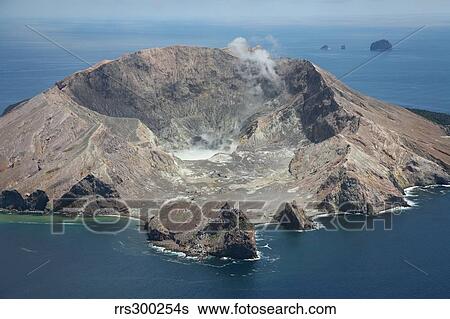 Stock Photograph - Aerial view of White Island volcano with central acidic crater lake, Bay of Plenty, New Zealand.. Fotosearch