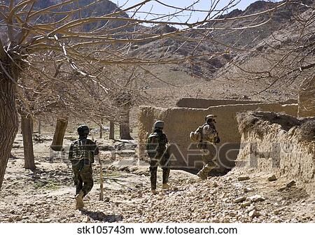 Picture - Afghan commandos are guided into the Khakrez District, Afghanistan.. Fotosearch