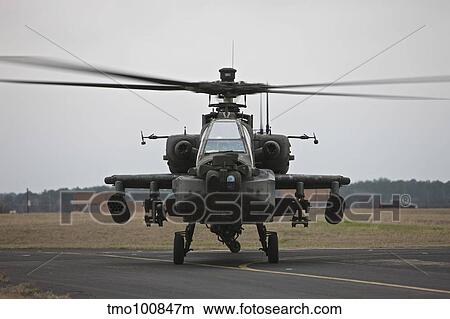AH-64 Apache helicopter on the runway. View Large Photo Image Picture - AH-64 Apache helicopter on the runway.. Fotosearch