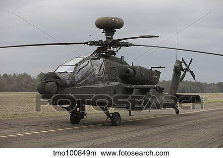 AH-64 Apache helicopter on the runway. View Large Photo Image Picture - AH-64 Apache helicopter on the runway.. Fotosearch