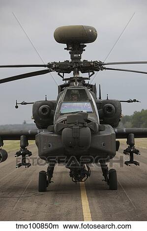 AH-64 Apache helicopter on the runway. View Large Photo Image Picture - AH-64 Apache helicopter on the runway.. Fotosearch