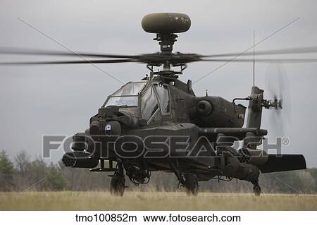AH-64 Apache helicopter on the runway. View Large Photo Image Picture - AH-64 Apache helicopter on the runway.. Fotosearch