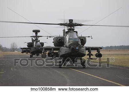 Picture - AH-64 Apache helicopter on the runway.. Fotosearch