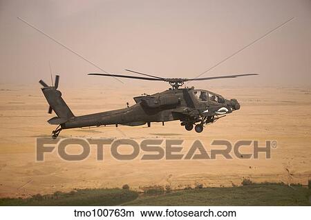 AH-64D Apache helicopter on a mission over Northern Iraq. View Large Photo Image Picture - AH-64D Apache helicopter on a mission over Northern Iraq.. Fotosearch
