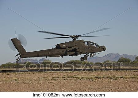 AH-64D Apache Longbow lifts off on a mission. View Large Photo Image Picture - AH-64D Apache Longbow lifts off on a mission.. Fotosearch