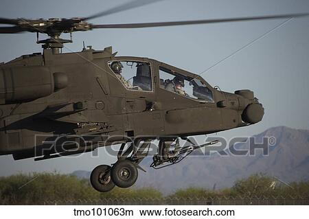 Picture - AH-64D Apache Longbow lifts off on a mission.. Fotosearch