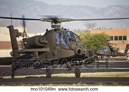 AH-64D Apache Longbow taxiing out to the launch pad. View Large Photo Image Picture - AH-64D Apache Longbow taxiing out to the launch pad.. Fotosearch