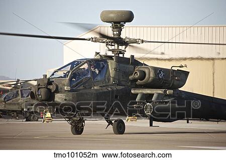 AH-64D Apache Longbow taxiing out to the launch pad. View Large Photo Image Picture - AH-64D Apache Longbow taxiing out to the launch pad.. Fotosearch