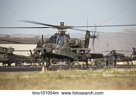AH-64D Apache Longbow taxiing out to the launch pad. View Large Photo Image Picture - AH-64D Apache Longbow taxiing out to the launch pad.. Fotosearch