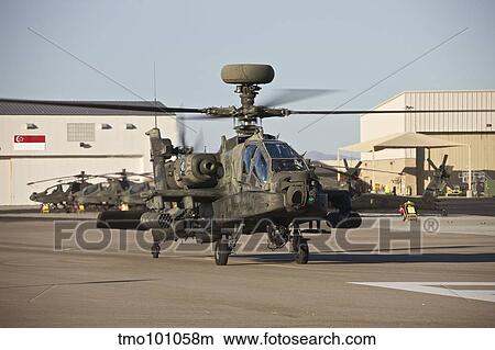 AH-64D Apache Longbow taxiing out to the launch pad. View Large Photo Image Picture - AH-64D Apache Longbow taxiing out to the launch pad.. Fotosearch