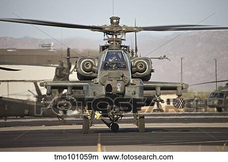 AH-64D Apache Longbow taxiing out to the launch pad. View Large Photo Image Picture - AH-64D Apache Longbow taxiing out to the launch pad.. Fotosearch