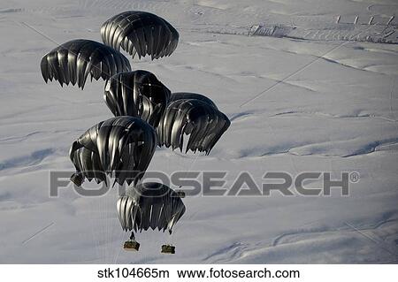 Air delivery cargo is released over Afghanistan. View Large Photo Image Picture - Air delivery cargo is released over Afghanistan.. Fotosearch