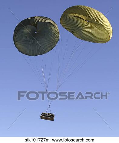 Air Delivery Platoon drops heavy equipment from a C-17. View Large Photo Image Picture - Air Delivery Platoon drops heavy equipment from a C-17.. Fotosearch