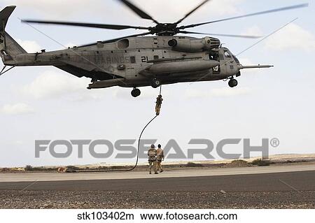 Air Force pararescuemen conduct a combat insertion and extraction exercise in Djibouti, Africa. View Large Photo Image Picture - Air Force pararescuemen conduct a combat insertion and extraction exercise in Djibouti, Africa.. Fotosearch