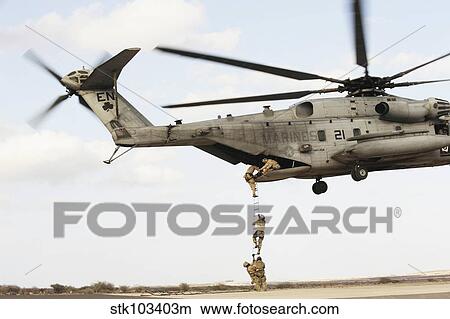 Air Force pararescuemen conduct a combat insertion and extraction exercise in Djibouti, Africa. View Large Photo Image Picture - Air Force pararescuemen conduct a combat insertion and extraction exercise in Djibouti, Africa.. Fotosearch