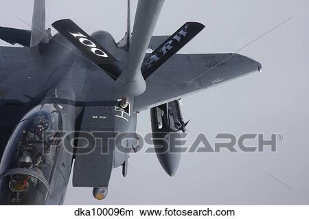 Air refueling a F-15E Strike Eagle of the U. S. Air Force. View Large Photo Image Picture - Air refueling a F-15E Strike Eagle of the U. S. Air Force.. Fotosearch