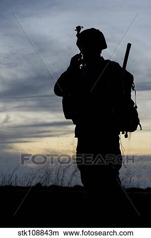 Picture - Air traffic controller communicates with team members.. Fotosearch