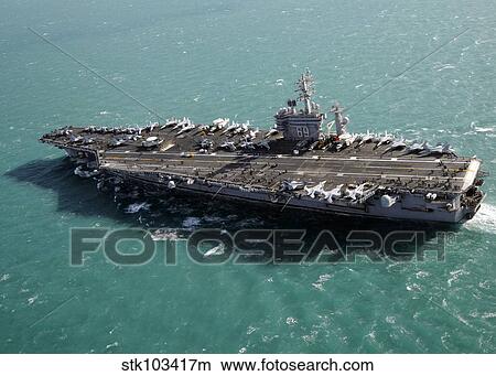 Aircraft carrier USS Dwight D. Eisenhower sails through the Meditteranean Sea. View Large Photo Image Picture - Aircraft carrier USS Dwight D. Eisenhower sails through the Meditteranean Sea.. Fotosearch