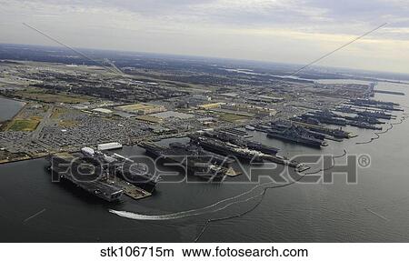 Aircraft carriers in port at Naval Station Norfolk, Virginia. View Large Photo Image Picture - Aircraft carriers in port at Naval Station Norfolk, Virginia.. Fotosearch
