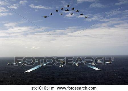 Aircraft fly over a group of U. S. and Japanese Maritime Self-Defense Force ships. View Large Photo Image Picture - Aircraft fly over a group of U. S. and Japanese Maritime Self-Defense Force ships.. Fotosearch