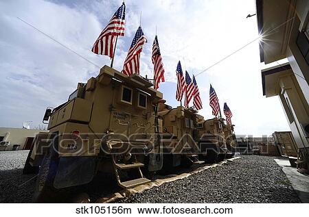 American flags are displayed on tactical vehicles in remembrance of 9/11. View Large Photo Image Picture - American flags are displayed on tactical vehicles in remembrance of 9/11.. Fotosearch