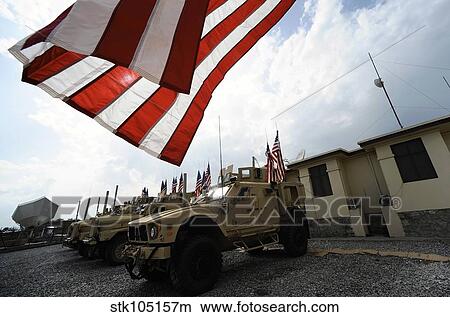 American flags are displayed on tactical vehicles in remembrance of 9/11. View Large Photo Image Picture - American flags are displayed on tactical vehicles in remembrance of 9/11.. Fotosearch