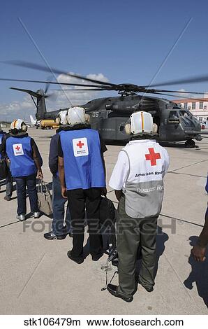 American Red Cross volunteers prepare to board a MH-53E Sea Dragon. View Large Photo Image Picture - American Red Cross volunteers prepare to board a MH-53E Sea Dragon.. Fotosearch
