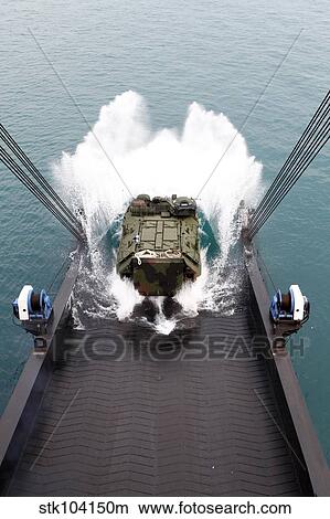 Amphibious assault vehicles disembark from USNS 1st LT Jack Lummus. View Large Photo Image Picture - Amphibious assault vehicles disembark from USNS 1st LT Jack Lummus.. Fotosearch