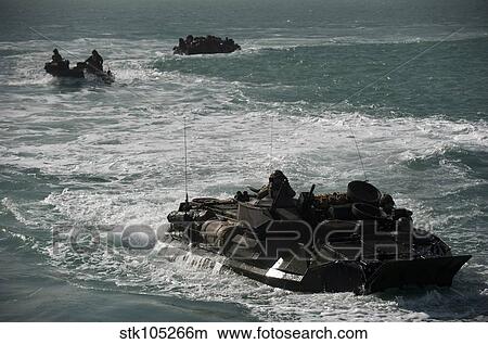 Amphibious assault vehicles transit the Arabian Gulf. View Large Photo Image Picture - Amphibious assault vehicles transit the Arabian Gulf.. Fotosearch