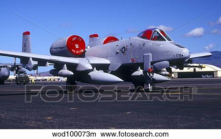 An A-10 Thunderbolt II parked on the flightline at Hickham Air Force Base. View Large Photo Image Picture - An A-10 Thunderbolt II parked on the flightline at Hickham Air Force Base.. Fotosearch