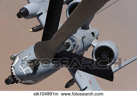 An A-10 Thunderbolt II receives fuel from a KC-135 Stratotanker. View Large Photo Image Picture - An A-10 Thunderbolt II receives fuel from a KC-135 Stratotanker.. Fotosearch