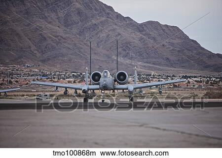 Picture - An A-10 Thunderbolt taxis to the runway at Nellis Air Force Base, Nevada.. Fotosearch