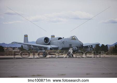 Picture - An A-10 Thunderbolt taxis to the runway at Nellis Air Force Base, Nevada.. Fotosearch