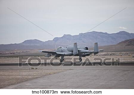 An A-10 Thunderbolt taxis to the runway at Nellis Air Force Base, Nevada. View Large Photo Image Picture - An A-10 Thunderbolt taxis to the runway at Nellis Air Force Base, Nevada.. Fotosearch