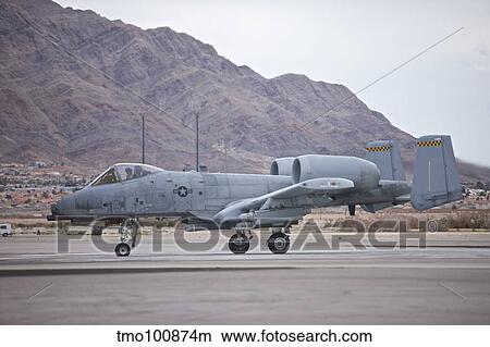 An A-10 Thunderbolt taxis to the runway at Nellis Air Force Base, Nevada. View Large Photo Image Picture - An A-10 Thunderbolt taxis to the runway at Nellis Air Force Base, Nevada.. Fotosearch