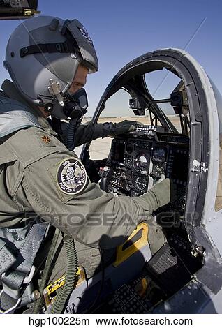An A-10C Thunderbird pilot goes through his preflight checks. View Large Photo Image Picture - An A-10C Thunderbird pilot goes through his preflight checks.. Fotosearch