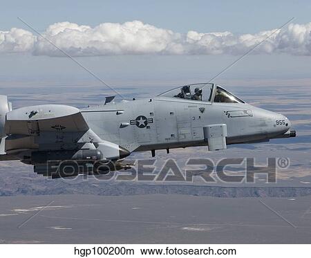 An A-10C Thunderbolt flies over the Saylor Creek bombing range, Idaho. View Large Photo Image Picture - An A-10C Thunderbolt flies over the Saylor Creek bombing range, Idaho.. Fotosearch